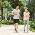 Couple jogging in park